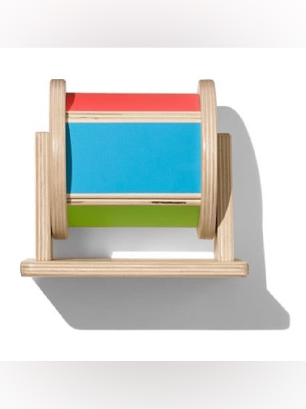 Lovevery Spinning Rainbow Wooden Rolling Drum Toy in Blue, Red & Green
